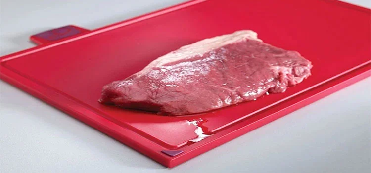 Red meat in a red colour chopping board