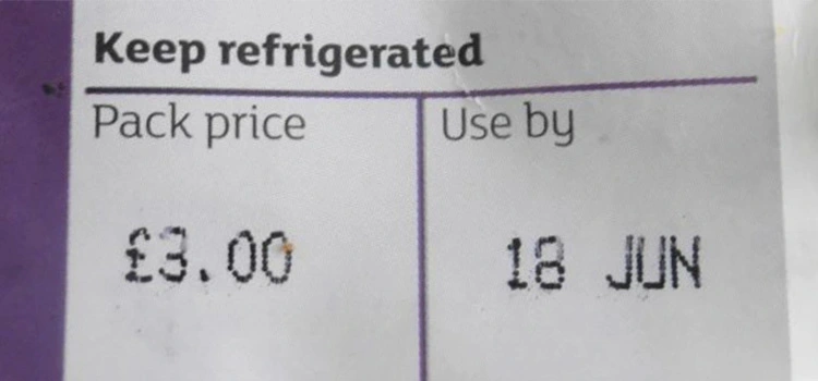A sticker showing the expire date of a frozen food