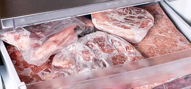Raw pork meat in freezer