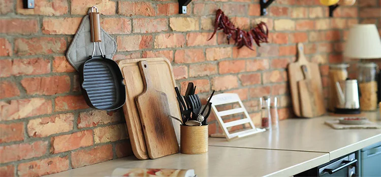 Kitchen utensils in a kitchen cabinet 