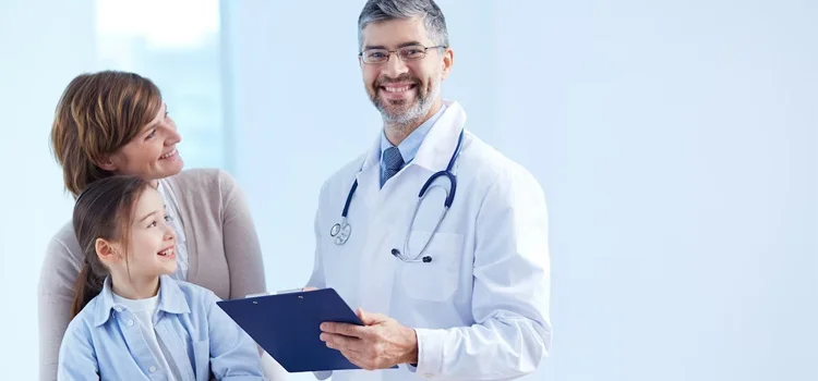 Happy doctor holding a clipboard with patients