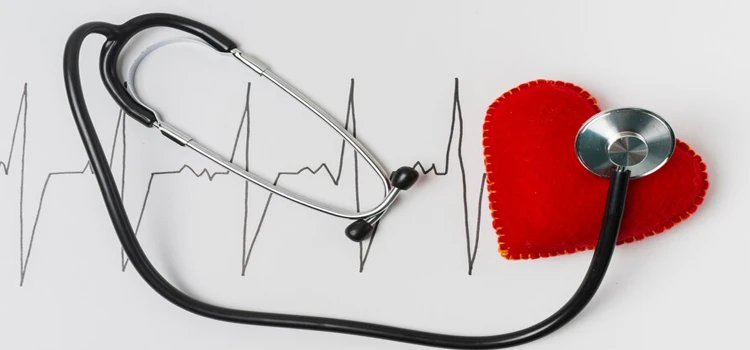 Heartbeat test image with stethoscope and small red heart 